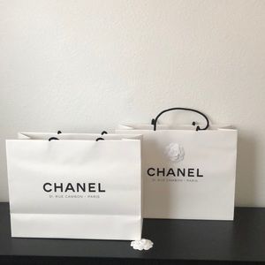 Chanel paper bags with camellia. Set of 2. Size about :H13”xL 17”xW6”